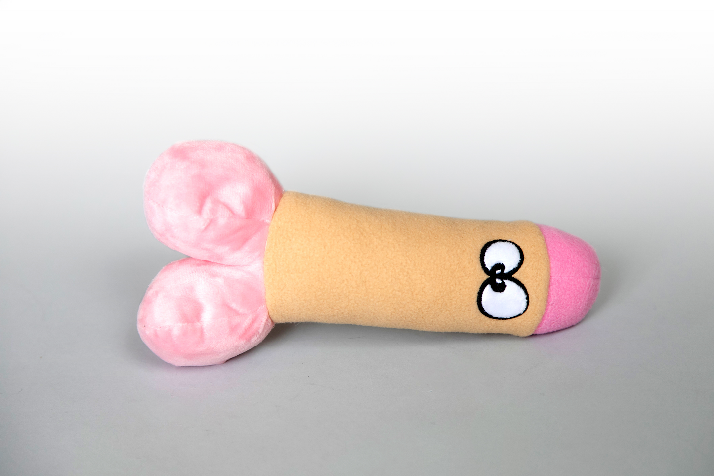 Scruffy Plushie Squeaky Dog Toy in the shape of a dildo